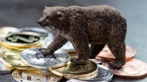 A conceptual image with a bear figure standing on top of cryptographic tokens.